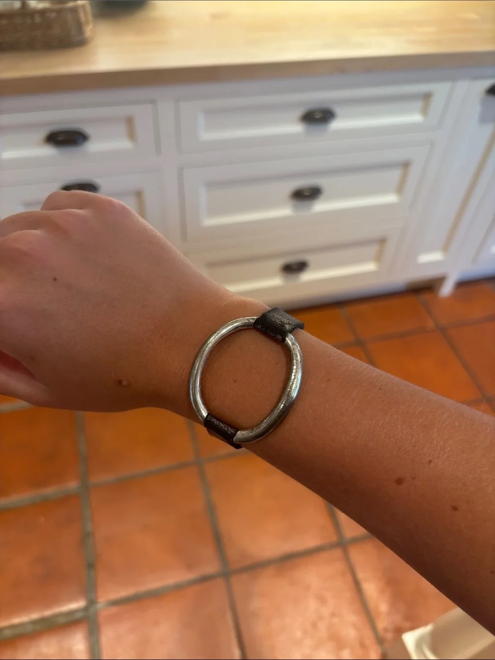 Minimalist Silver-Tone Oval Bracelet with Black Leather Accents